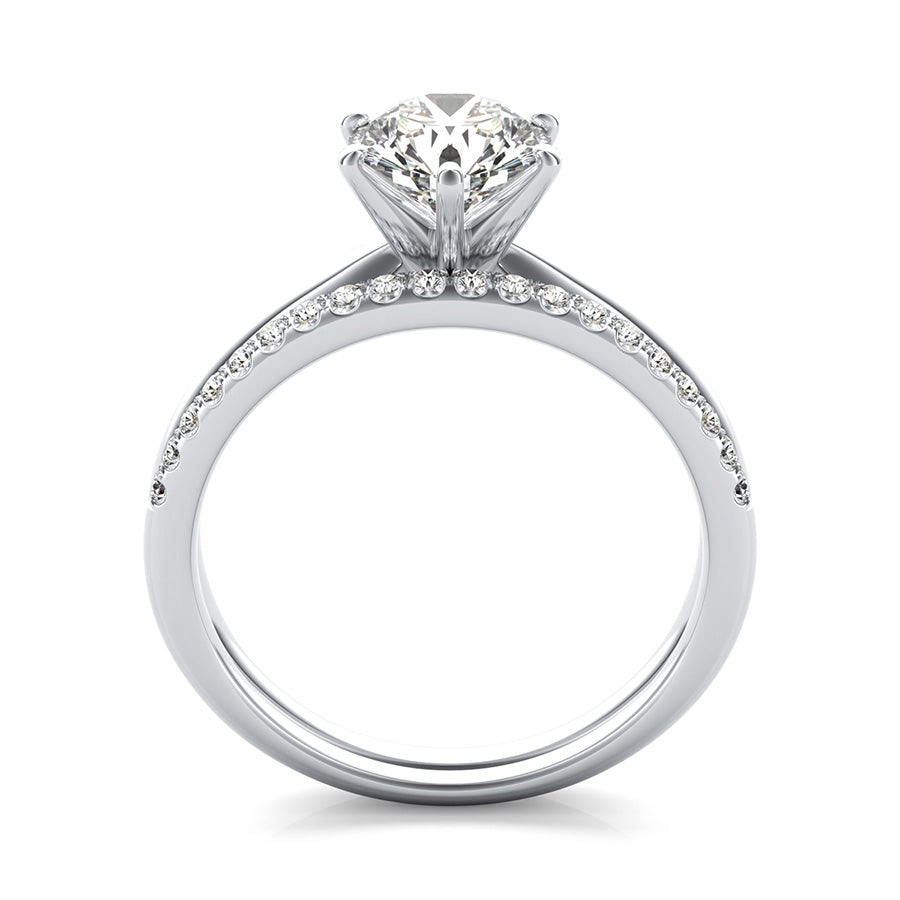 Delicate And Classic Solitaire Engagement Ring With Matching Band
